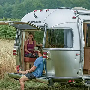 An Airstream Trade Wind travel trailer